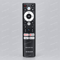 Black remote control with 'Remote Hut' branding on a sandy background