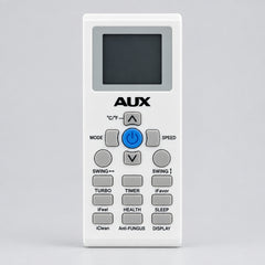AUX remote control on a table with a blurred background