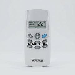 Walton remote control with a blurred indoor background