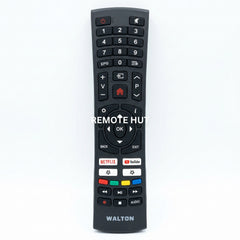 Black remote control with multiple buttons on a marble surface, featuring the brand 'Walton'.