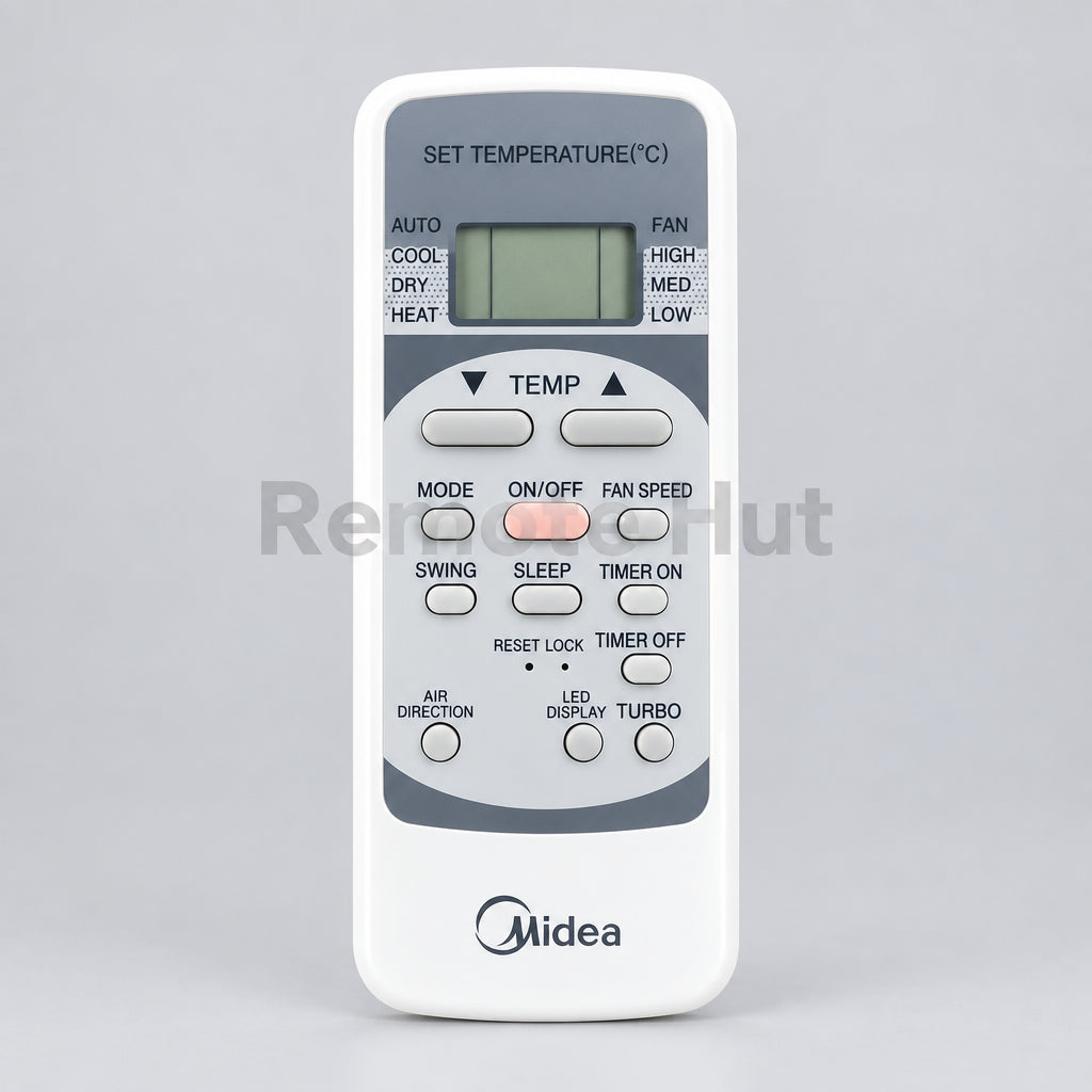 Midea air conditioner remote control with green leaves in the background