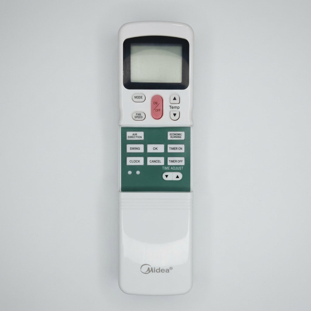 Midea remote control on a wooden surface with vegetables