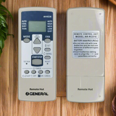 Two remote control units for air conditioning on a textured surface