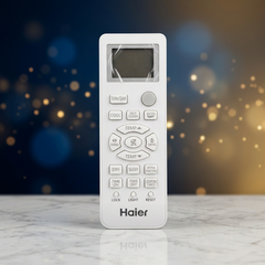 Haier remote control on a light gray background