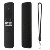 Black remote control with textured case and lanyard on a white background