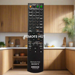 Black Sony remote control with 'Remote Hut' branding in a kitchen setting