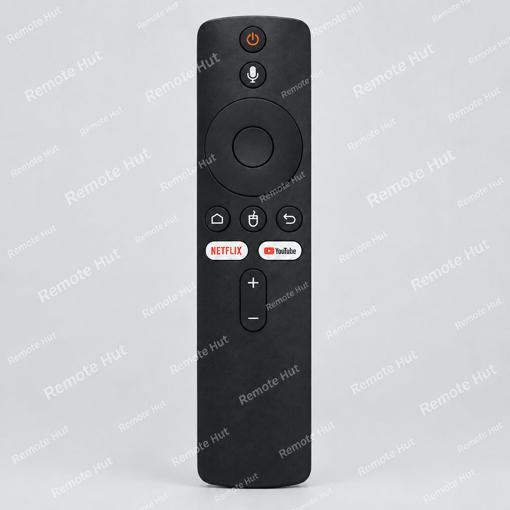 A black remote control with buttons, designed for voice commands and compatible with various electronic devices.